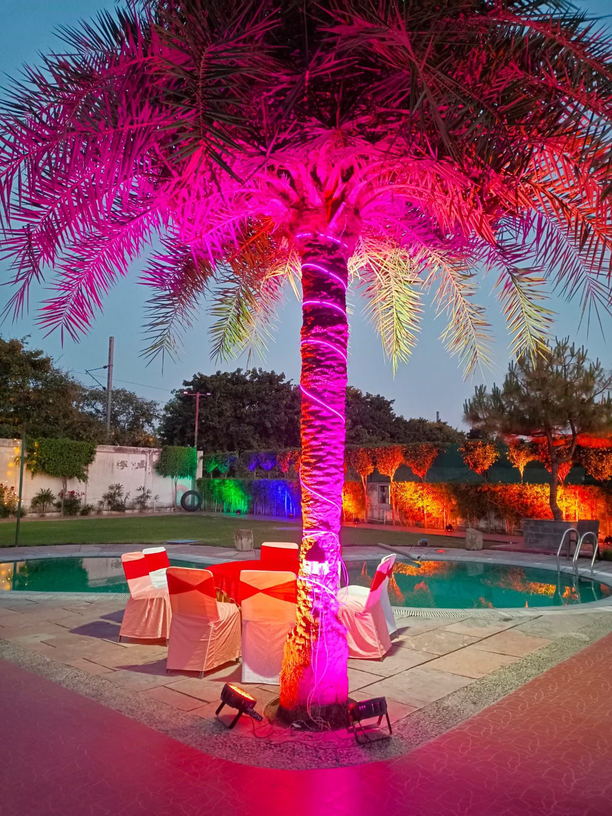 Colourful mehndi setup by the pool